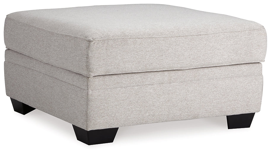 Dellara 4-Piece Sectional with Ottoman