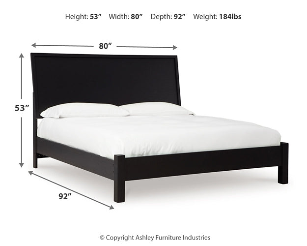 Danziar King Panel Bed with Mirrored Dresser