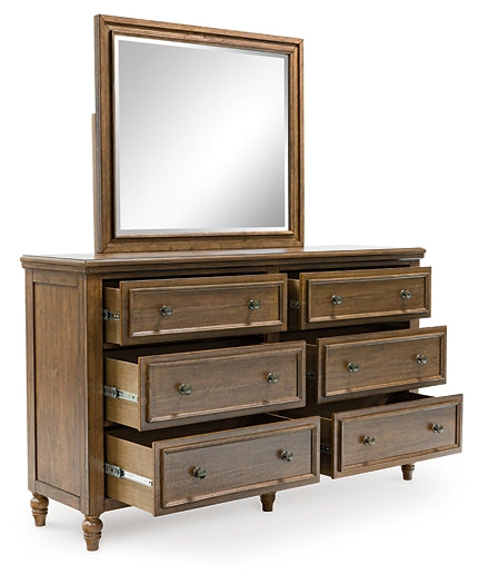 Sturlayne California King Upholstered Panel Bed, Dresser, Mirror and Nightstand