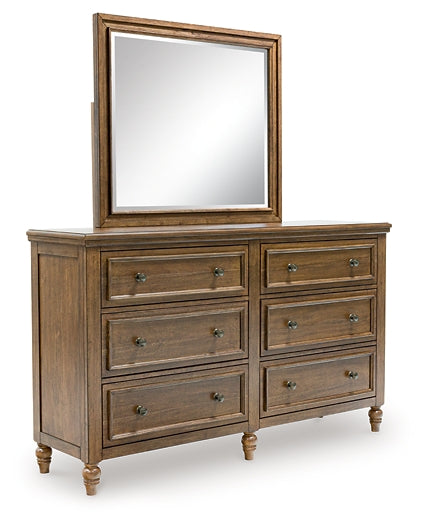 Sturlayne King Upholstered Panel Bed, Dresser, Mirror, Chest and Nightstand