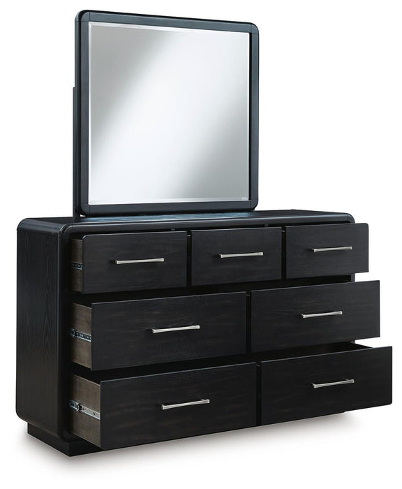 Rowanbeck California King Upholstered Panel Bed with Mirrored Dresser